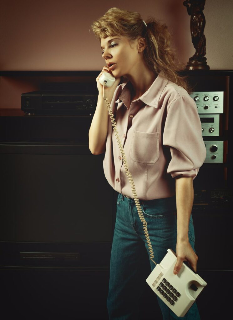 Young Blonde Woman in 90s-Inspired Vintage Clothing