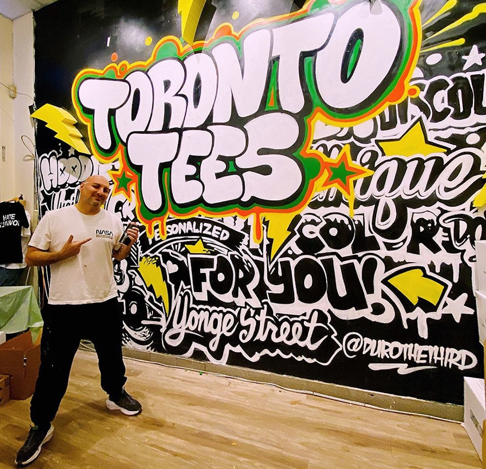 Custom hoodies from TorontoTees showcasing unique designs and vibrant colours